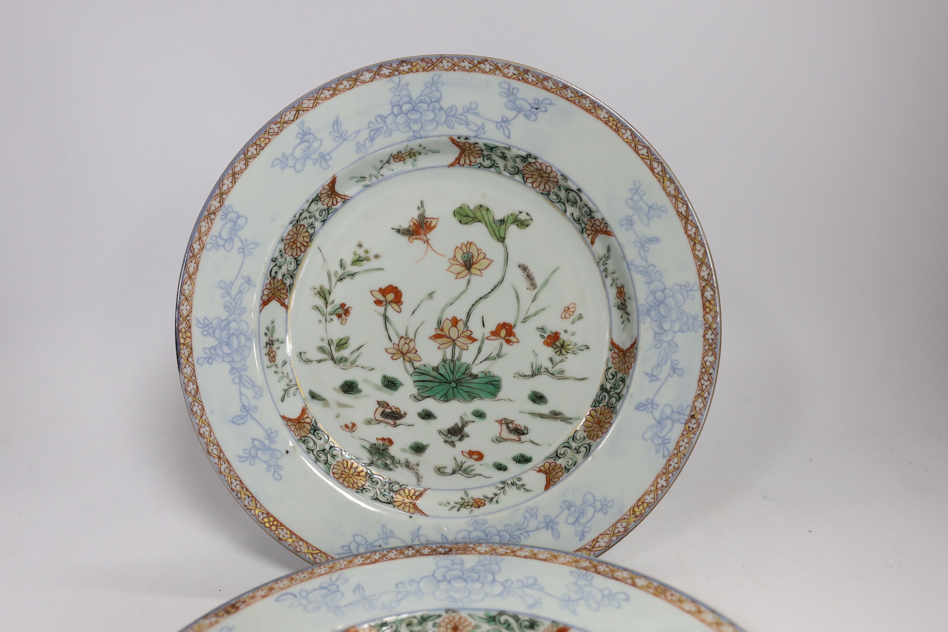 A pair of Chinese famille verte ‘lotus pond’ plates, Kangxi-Yongzheng period, 22.5cm